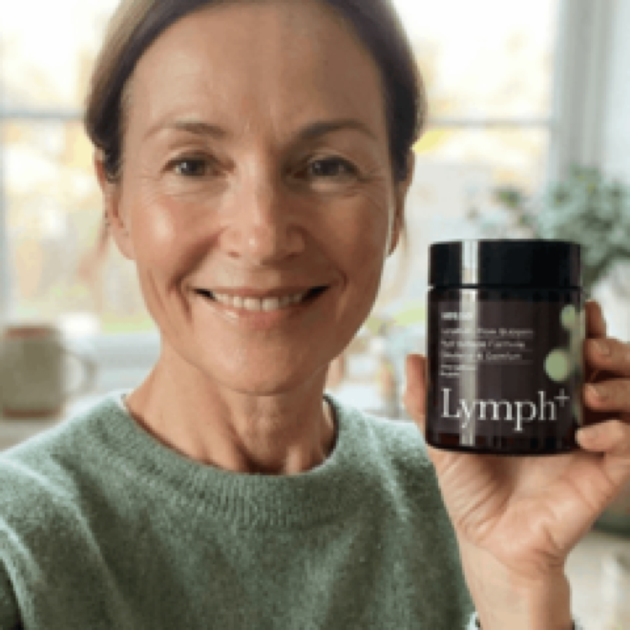 Margaret D. holding her jar of Lymph+